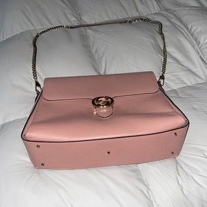 Gucci pink pink purse . Less than 2 years old . Only worn 3x it’s in perfect